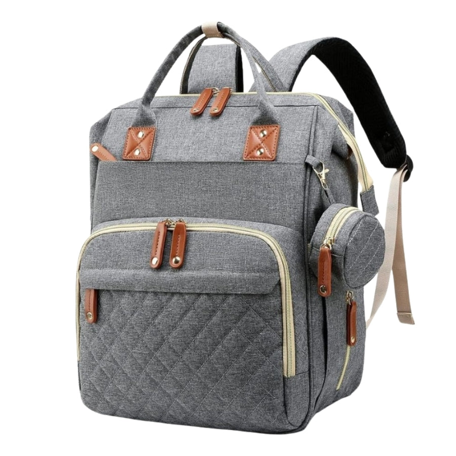 Mochila maternal convertible con cambiador. Gris